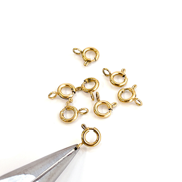 ess25【10個入り】直径約5mm / 太さ約1mm ヒキワ金具（引き輪）18KGP アクセサリー用留め具 6枚目の画像