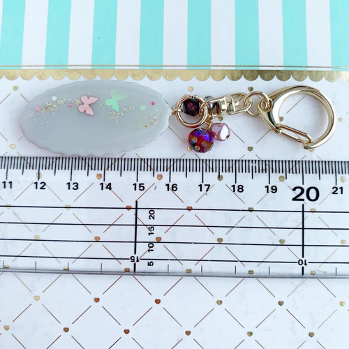 【2776】クラリネット アナベルやカラミンサ入りのホワイトオーバルキーホルダー 2776】クラリネット アナベルやカラミンサ入りのホワイトオーバル