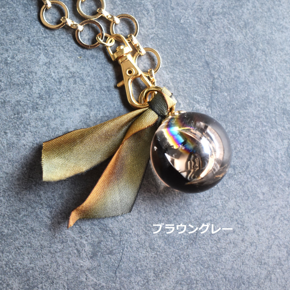 【數量有限 - 可選彩虹石英、煙晶和鳶尾石英】手工染色絲帶包飾 第2張的照片