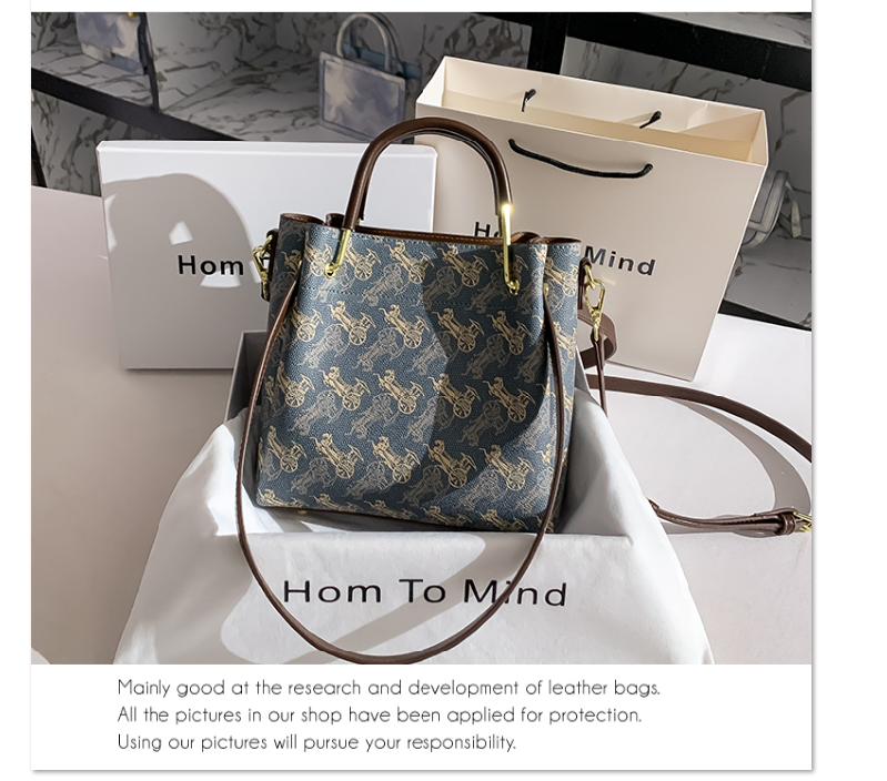 本革の水桶の包み女の七夕の贈り物は女友のお母さんに送ります高級感減齢の大容量は金の託特包にぶつかりません