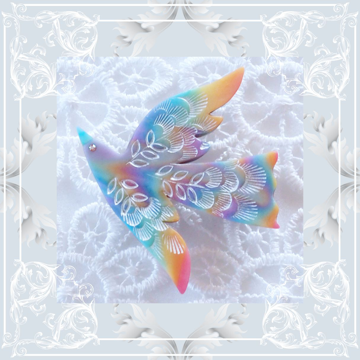 彩雲の鳥ブローチ