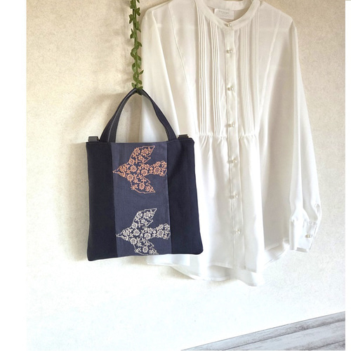 ミナペルホネン[直営店限定] オデッセイodyssey 綿羊革黒 バッグ