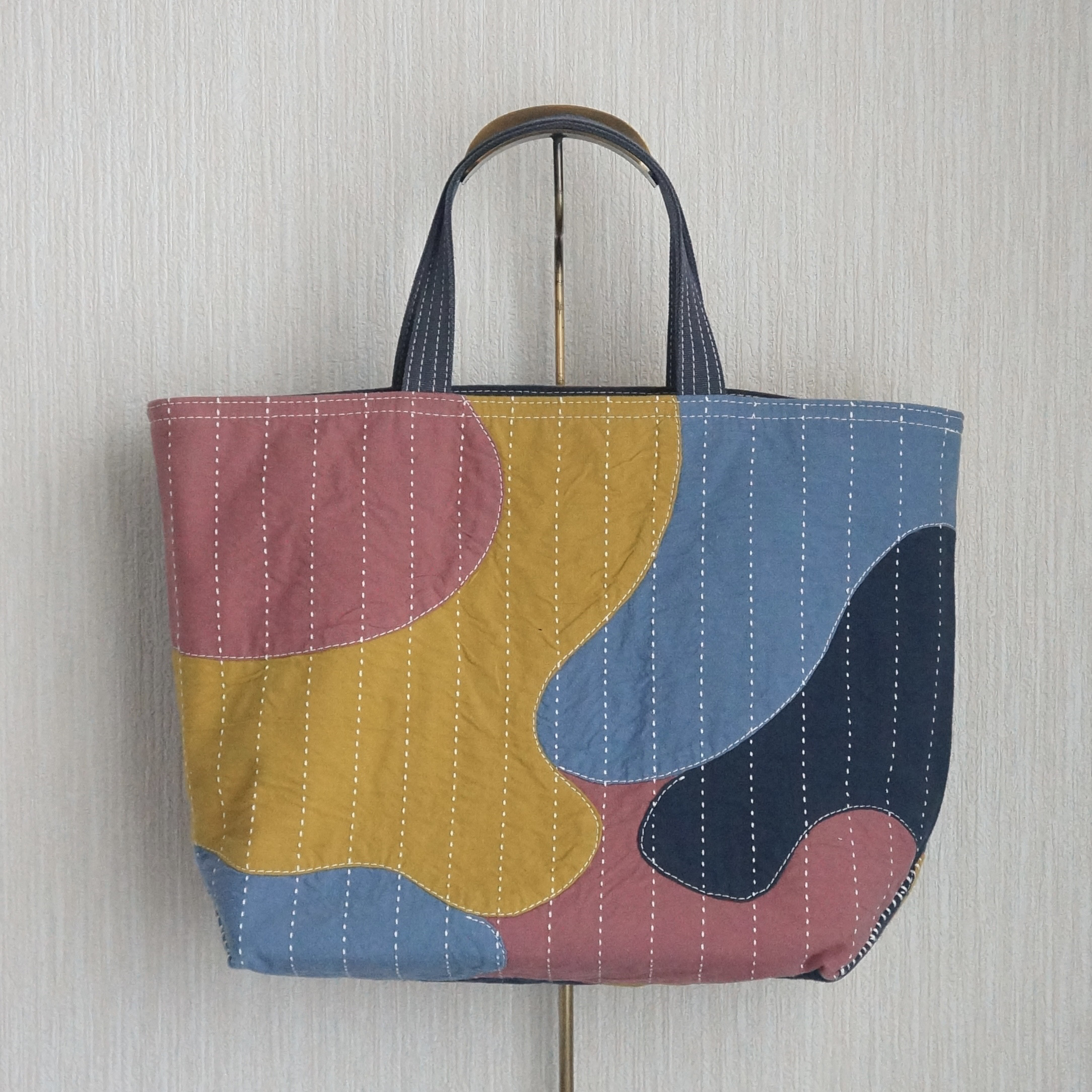 カモフラ風パッチワークの帆布トートバッグ 24,750円