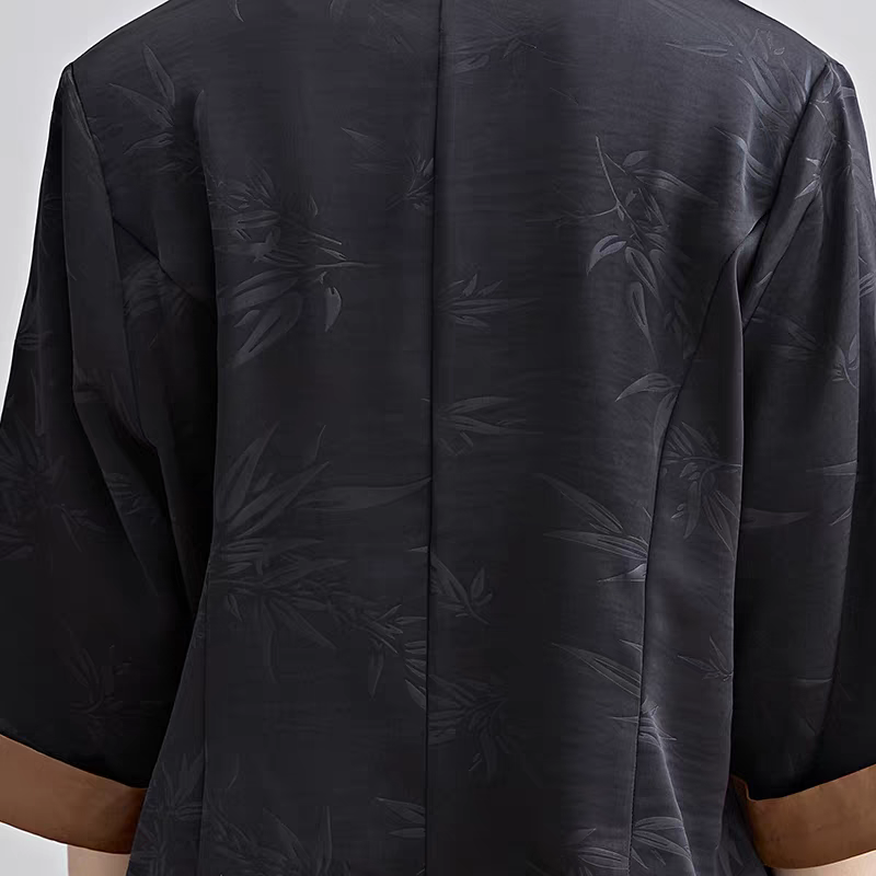 ボタニカル柄×レザー風生地の切り替えが斬新♪オープンフロントジャケット ブラック