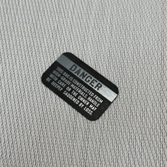 ◆ TUMIバッグ用◆ カスタムプレート DANGER マットブラック x 銀 ■ トゥミ 交換用 アメリカ空軍 2枚目の画像