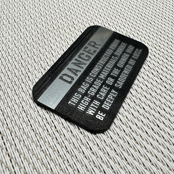 ◆ TUMIバッグ用◆ カスタムプレート DANGER マットブラック x 銀 ■ トゥミ 交換用 アメリカ空軍 1枚目の画像