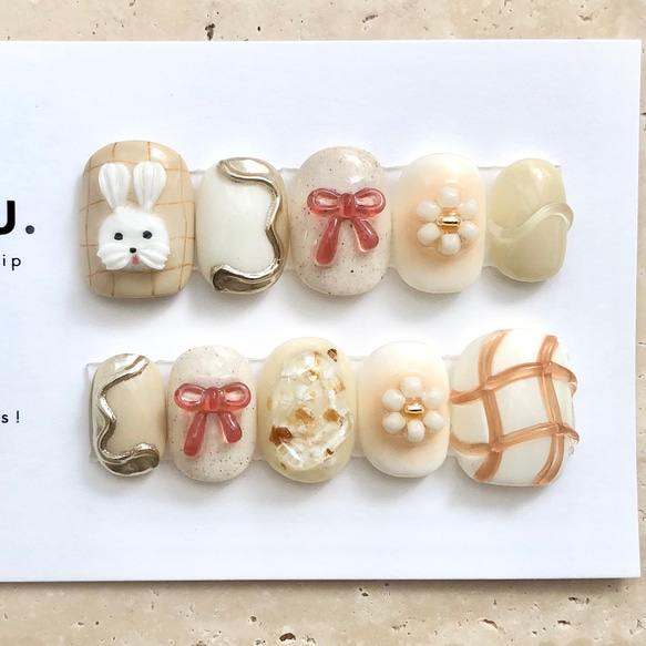 うさパンケーキ【サイズオーダー制】￤ネイルチップ うさぎ 淡色 リボン 落書き 花 チェック柄 うるうる 1枚目の画像