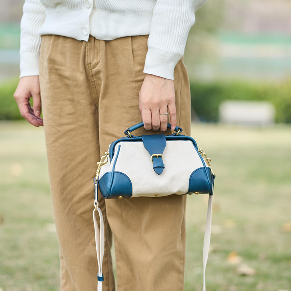 「帆布×革の組み合わせ」大人気！フラットタイプのがま口バッグ 手作りのショルダーバッグ　2WAY 中型鞄 3枚目の画像