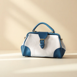 「帆布×革の組み合わせ」大人気！フラットタイプのがま口バッグ 手作りのショルダーバッグ　2WAY 中型鞄 1枚目の画像