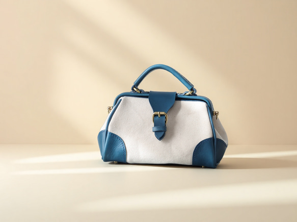 「帆布×革の組み合わせ」大人気！フラットタイプのがま口バッグ 手作りのショルダーバッグ　2WAY 中型鞄 1枚目の画像