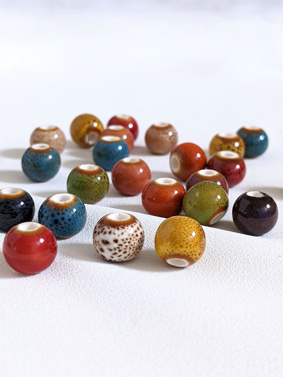 陶器 ビーズ アソート 10個 通し穴 パーツ アクセサリー 1枚目の画像