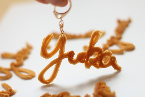 【オーダーメイド：キーホルダー】おなまえの絞り出しクッキー（アルファベットのみ） 6枚目の画像