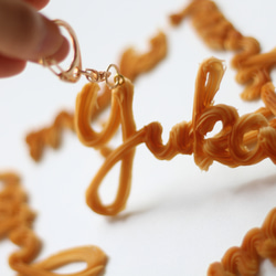 【オーダーメイド：キーホルダー】おなまえの絞り出しクッキー（アルファベットのみ） 4枚目の画像