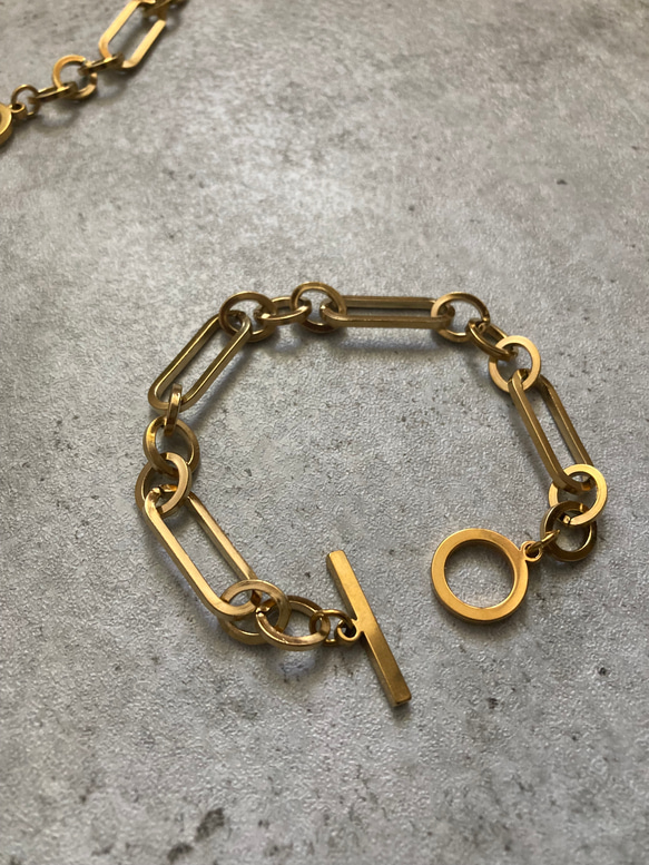 ーanguleux braceletー　ブレスレット　チェーンブレスレット　サージカルステンレス　アンティークゴールド 1枚目の画像