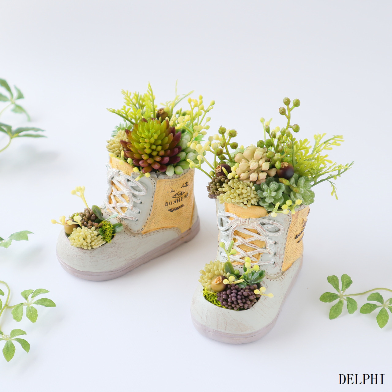 新たな一歩を彩るシューズ型グリーンアレンジメント【アーティフィシャルフラワー/造花】フェイクグリーン　多肉植物　開店祝い