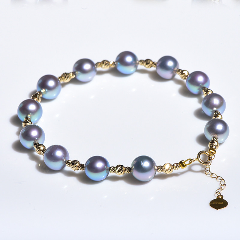 ルミナ7～7.5mmの天然アコヤ真珠ブレスレット。18金ゴールドビーズ付き。エレガントでスタイリッシュなので、彼女へのプレゼント