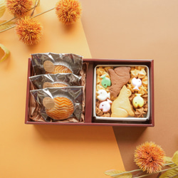 期間限定「栗のガレット」と人気の「おすわりネコ缶」のセットです。 1枚目の画像