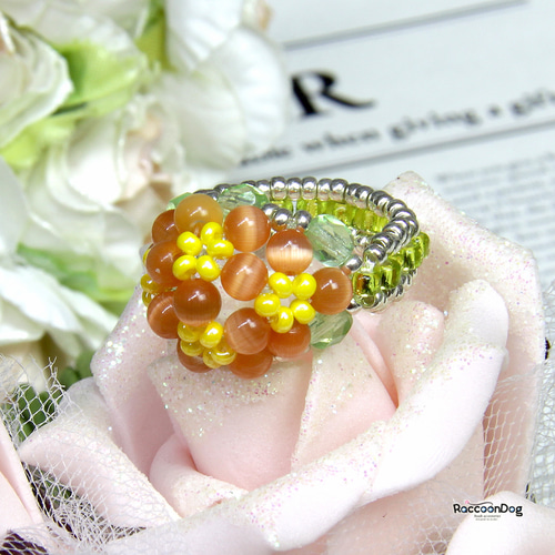 プリムラジュリアン・キャッツアイオレンジ色リング（キャッツアイ