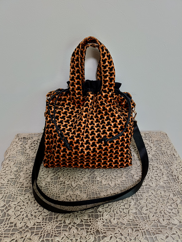 幾何学コーデュロイ巾着型2ウェイショルダーバッグオレンジ 1枚目の画像