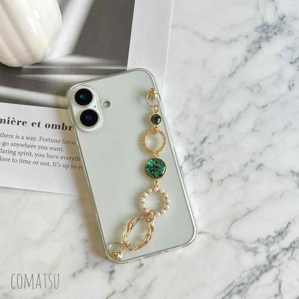 [全機種対応] 洗練ラグジュアリー ハンドホルダー付きスマホケース 落下防止ベルトストラップ付きスマホカバー 1枚目の画像