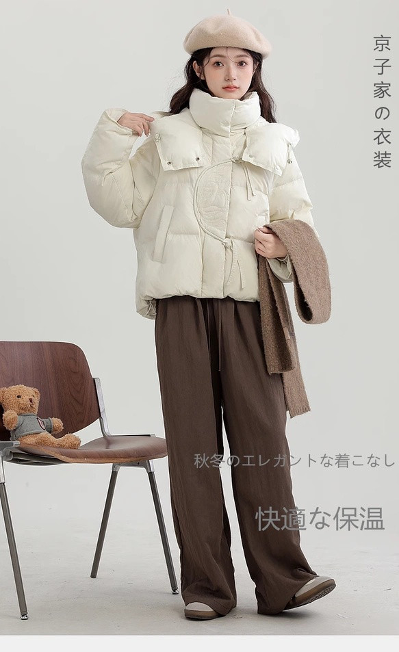 2025冬の刺繍米ホワイトダウンジャケット女性のデザイン感を厚くした保温パンのジャケット