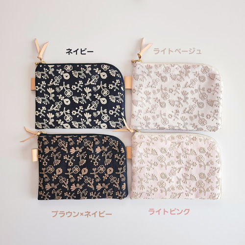 ミナペルホネン×check&stripeのL字ファスナーポーチ│母子手帳ケース