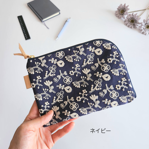 ミナペルホネン×check&stripeのL字ファスナーポーチ│母子手帳ケース