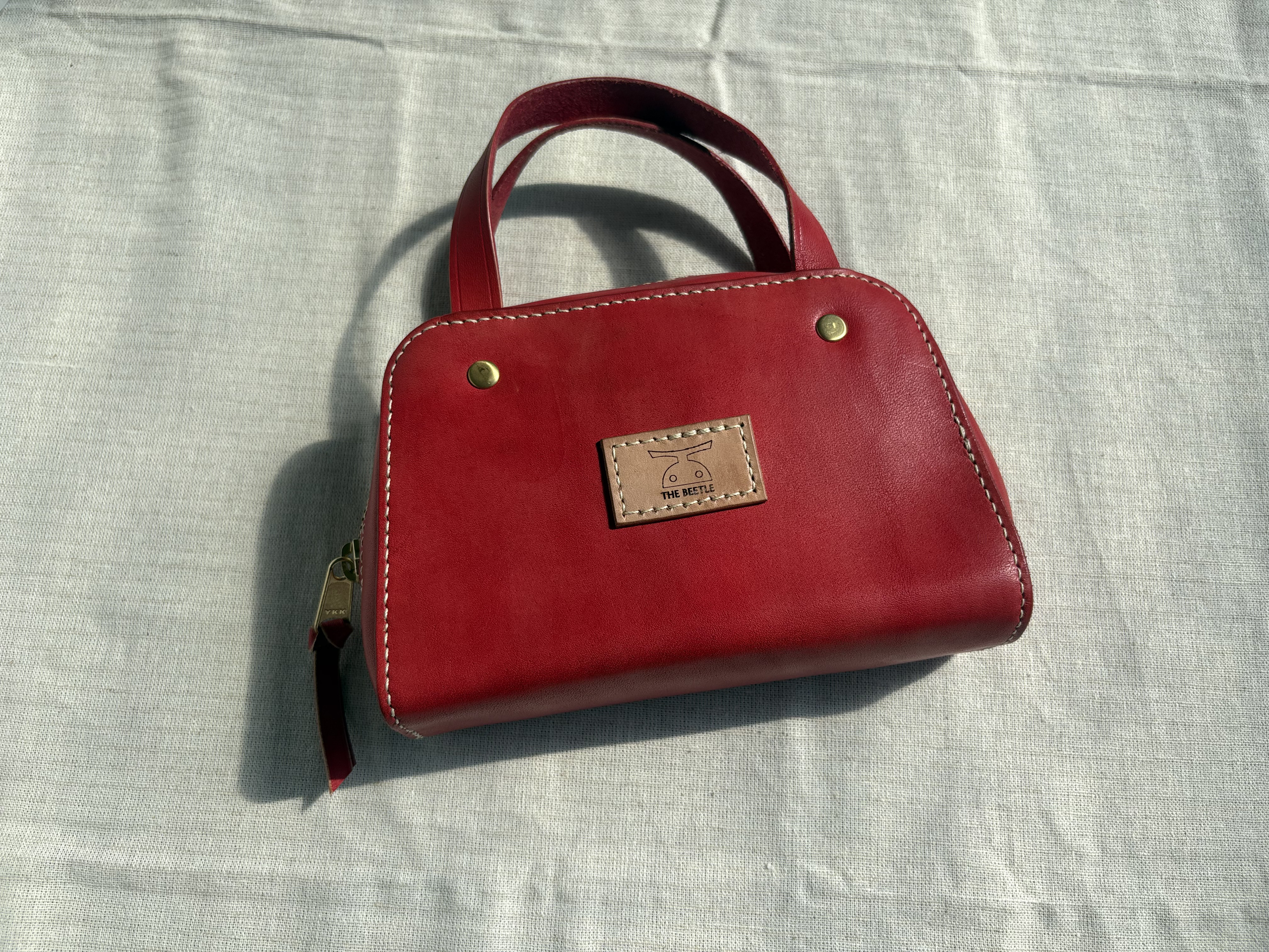 ころんと可愛いミニボストンポーチ｜手縫いの本革ポーチ