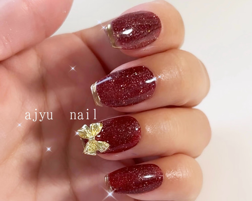 深紅の煌めきネイルチップ｜艶めくボルドー リボン フラッシュネイル