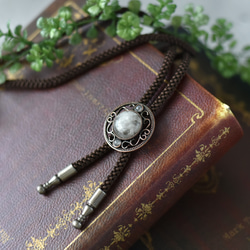 澄玻璃の閾(すまはりのしきい)｜水晶と赤銅の模様がシックなループタイ／ユニセックス ゴシック シック 天然石 メンズ 1枚目の画像