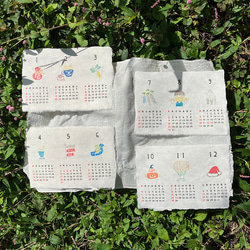 2026年カレンダー「3ヶ月めくり」各月ごとに心和む「いっぷくハンコ」のワンポイント 手漉き和紙使用 1枚目の画像