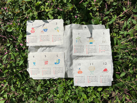 2026年カレンダー「3ヶ月めくり」各月ごとに心和む「いっぷくハンコ」のワンポイント 手漉き和紙使用 1枚目の画像