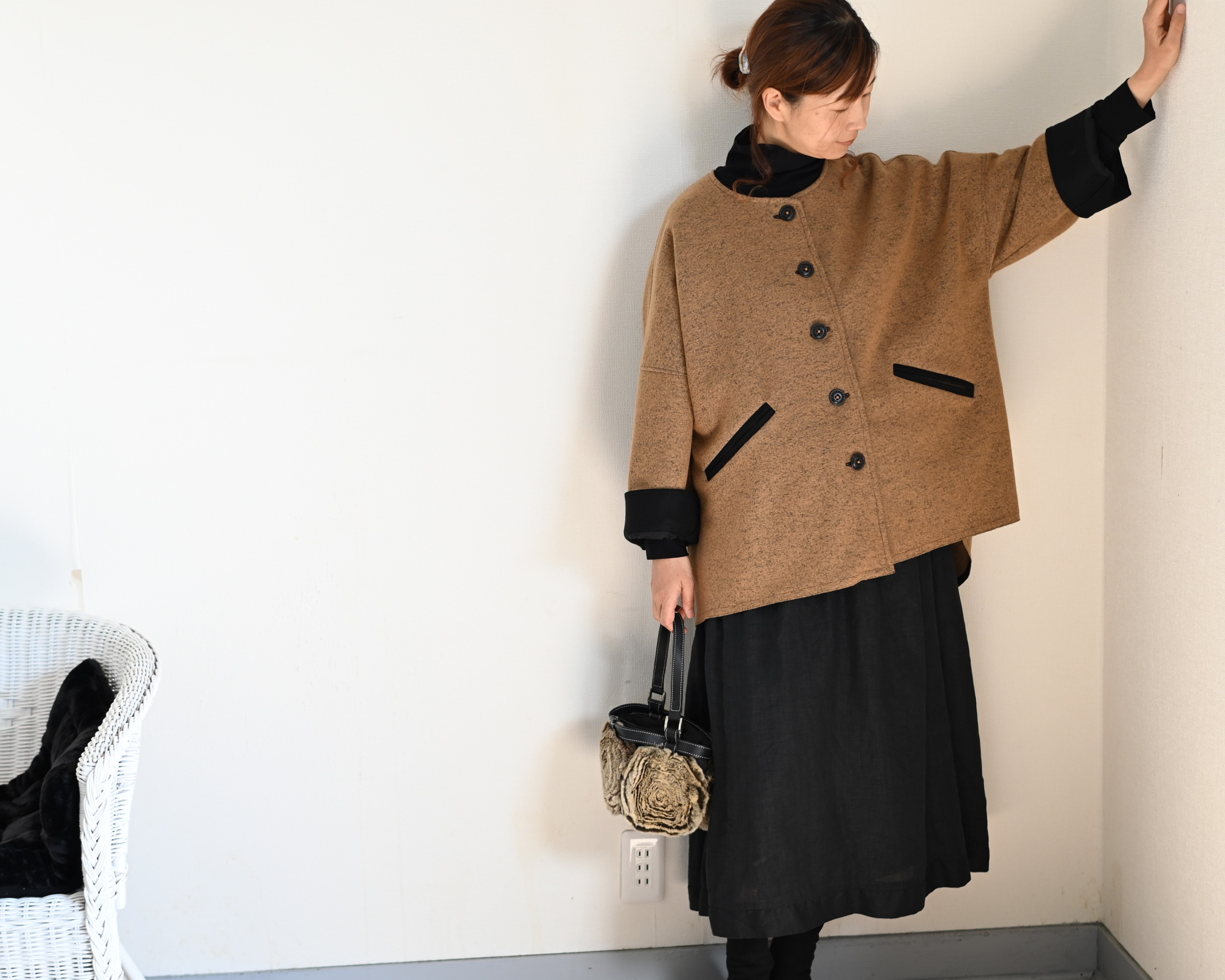 キャメルカラーのウールボックスコート