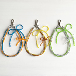 〔 NEW 〕 Phone Strap（（ ribbon ⌇ハンドストラップ スマホストラップ りぼん クリア カラフル 1枚目の画像