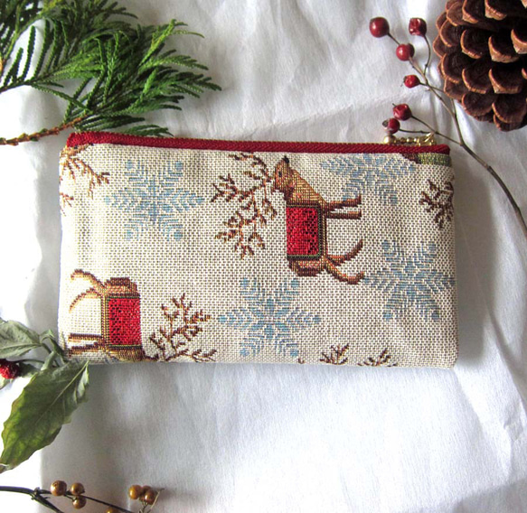 再販2025クリスマス　オランダ生地（MS）トナカイのポーチ　小銭入れ　鍵入れ　コスメ入れ 1枚目の画像