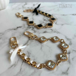 ≪全機種対応≫キラキラcharmmyりぼん ハンドストラップ付きスマホケース 落下防止スマホストラップ付きスマホカバー 2枚目の画像