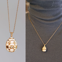 『秘める想い』 小さな宝箱のようなエッグペンダント　ネックレス　ゴールド　ネコポス送料無料 1枚目の画像