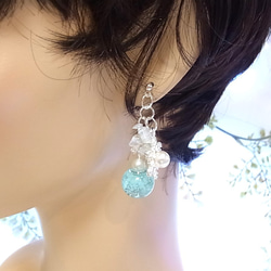 ピアス 雪の結晶 輝く夜光ガラスドーム 4枚目の画像