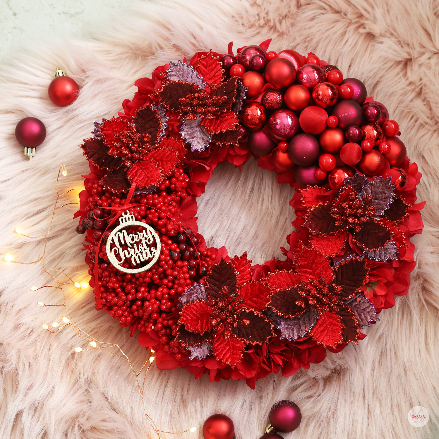レッド＆パープルポインセチアのクリスマスリース（直径約32cm）