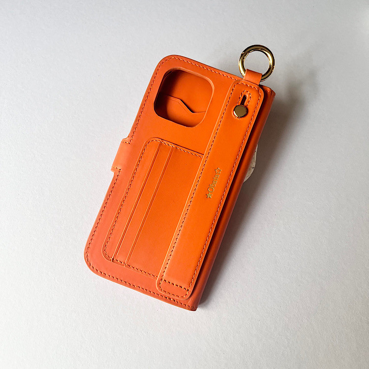 手帳型スマホケース　カラビナ付き　本革　名入れ可　カード収納　ハンドベルト付き　　iphoneケース  オレンジ