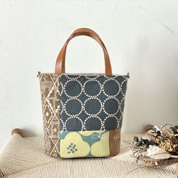 ⚮̈ミナペルホネン jungle relief シプリバッグ 巾着ショルダーバッグ