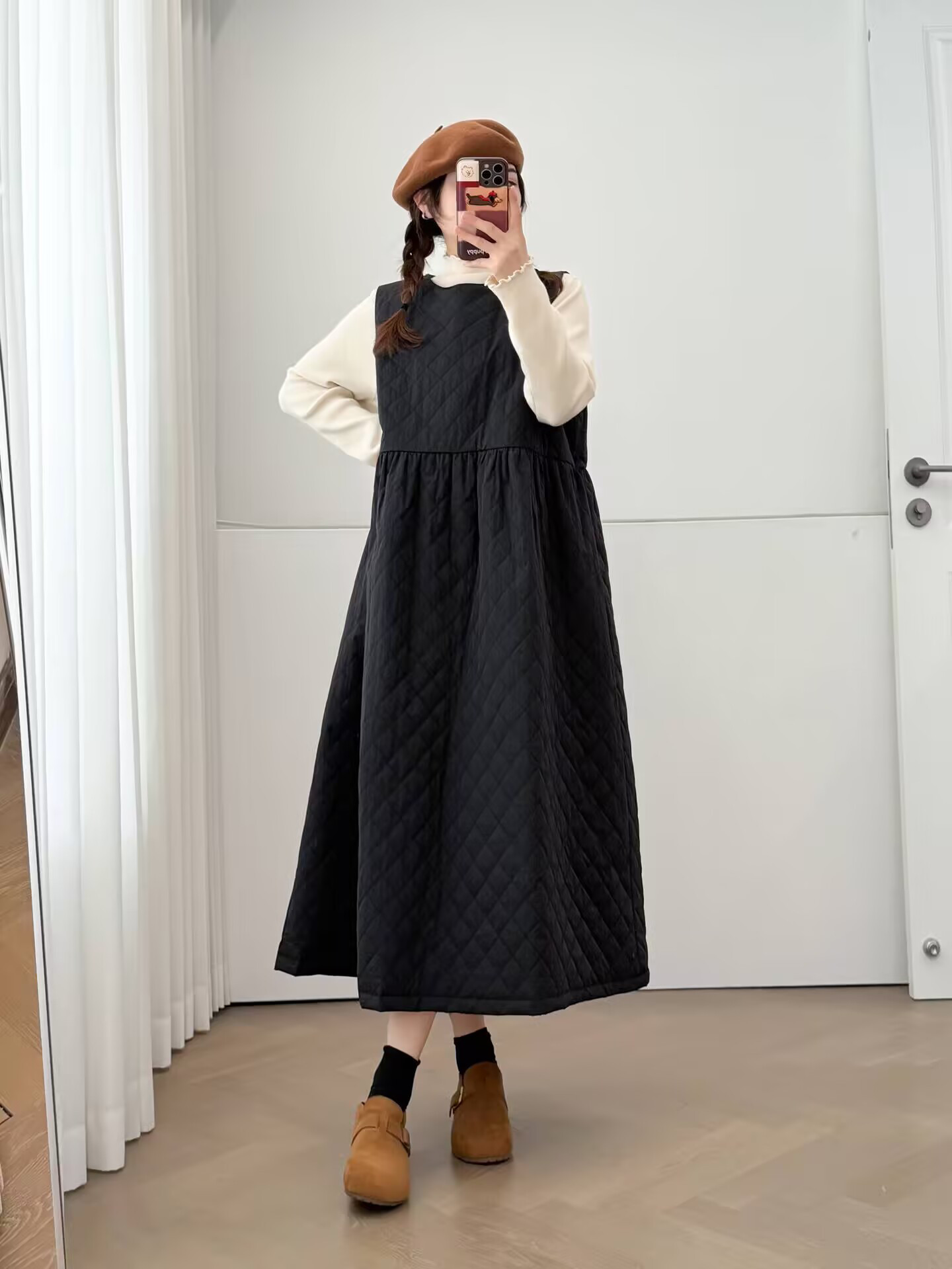 冬服の新しい婦人服のスリットは綿を挟んで厚めのワンピースを重ね着します