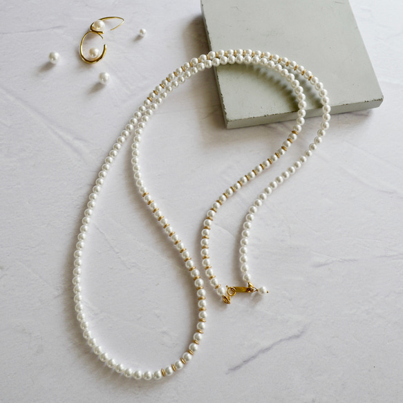 【配戴即可展現優雅氣質】珍珠金雙股項鍊，可單戴或雙股配戴。完美搭配畢業典禮、入學典禮和針織衫。秋冬季節適用。 第1張的照片