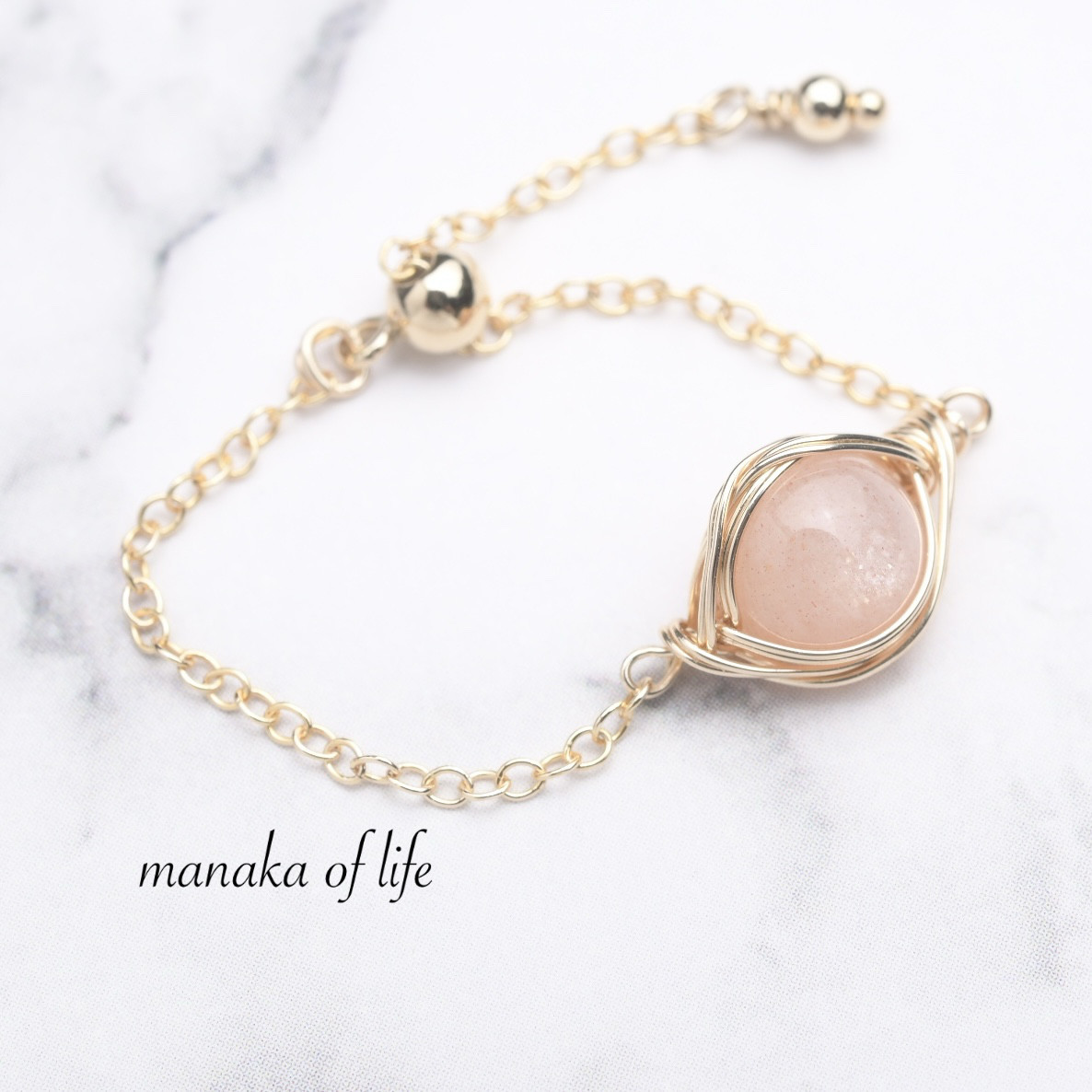 ピーチムーンストーン チェーンリング  ワイヤーラッピング 14kgf 天然石 送料無料でお届けします