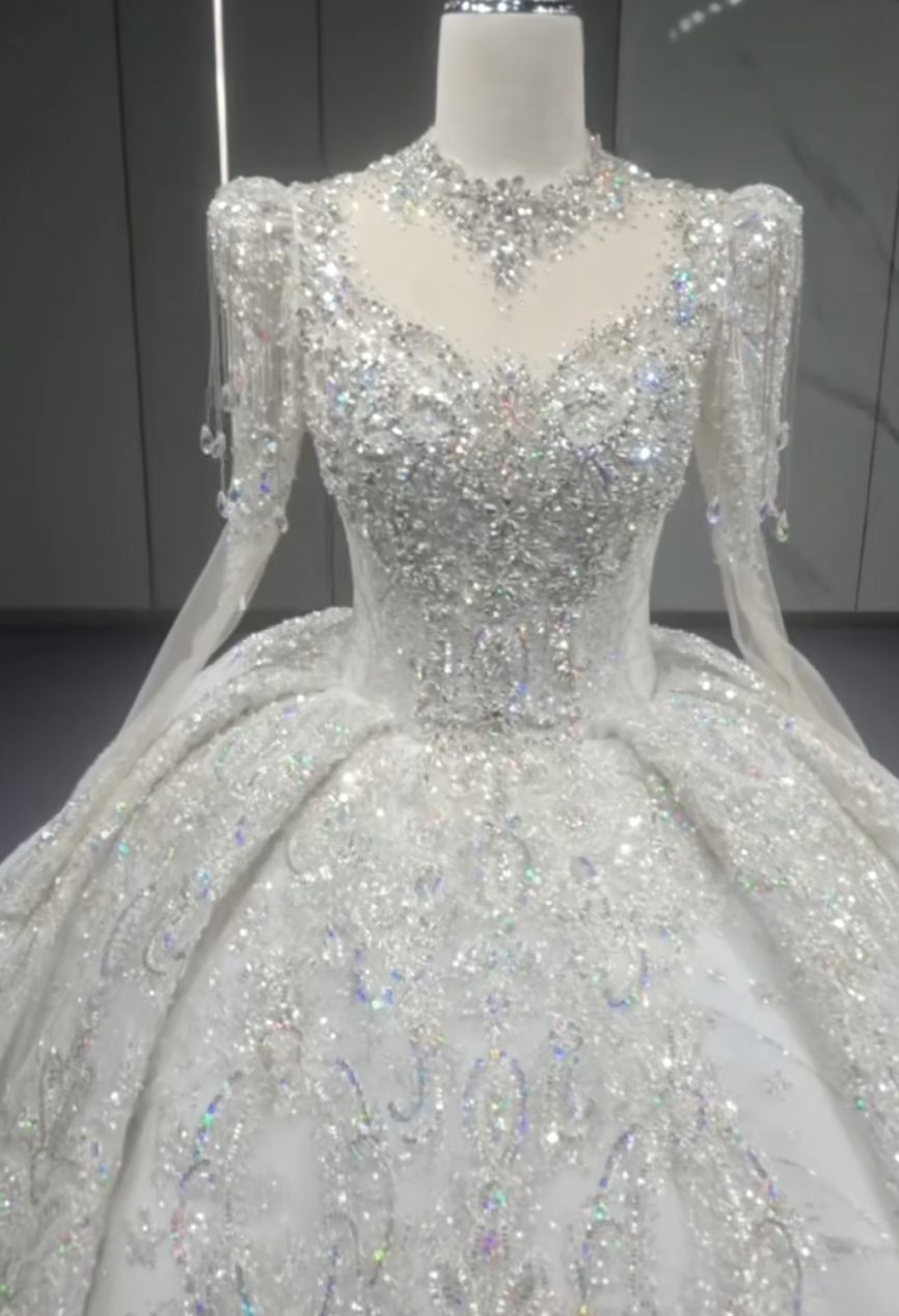 お買い得　イリュージョンネック　背中空き　ロングトレーン　華やかなウェディングドレス　長袖シースルー　ラメ入りグッリター