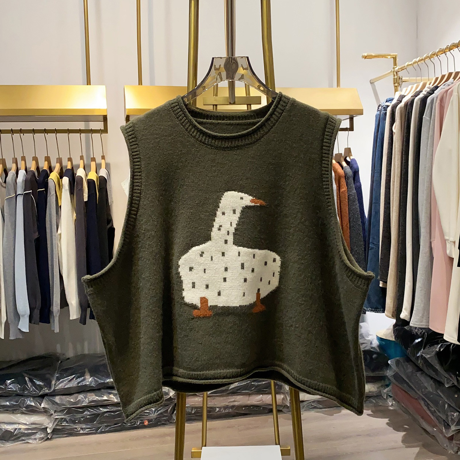 レディース ニットベスト アヒル柄 ロールネック ゆったり トップス 5,536円