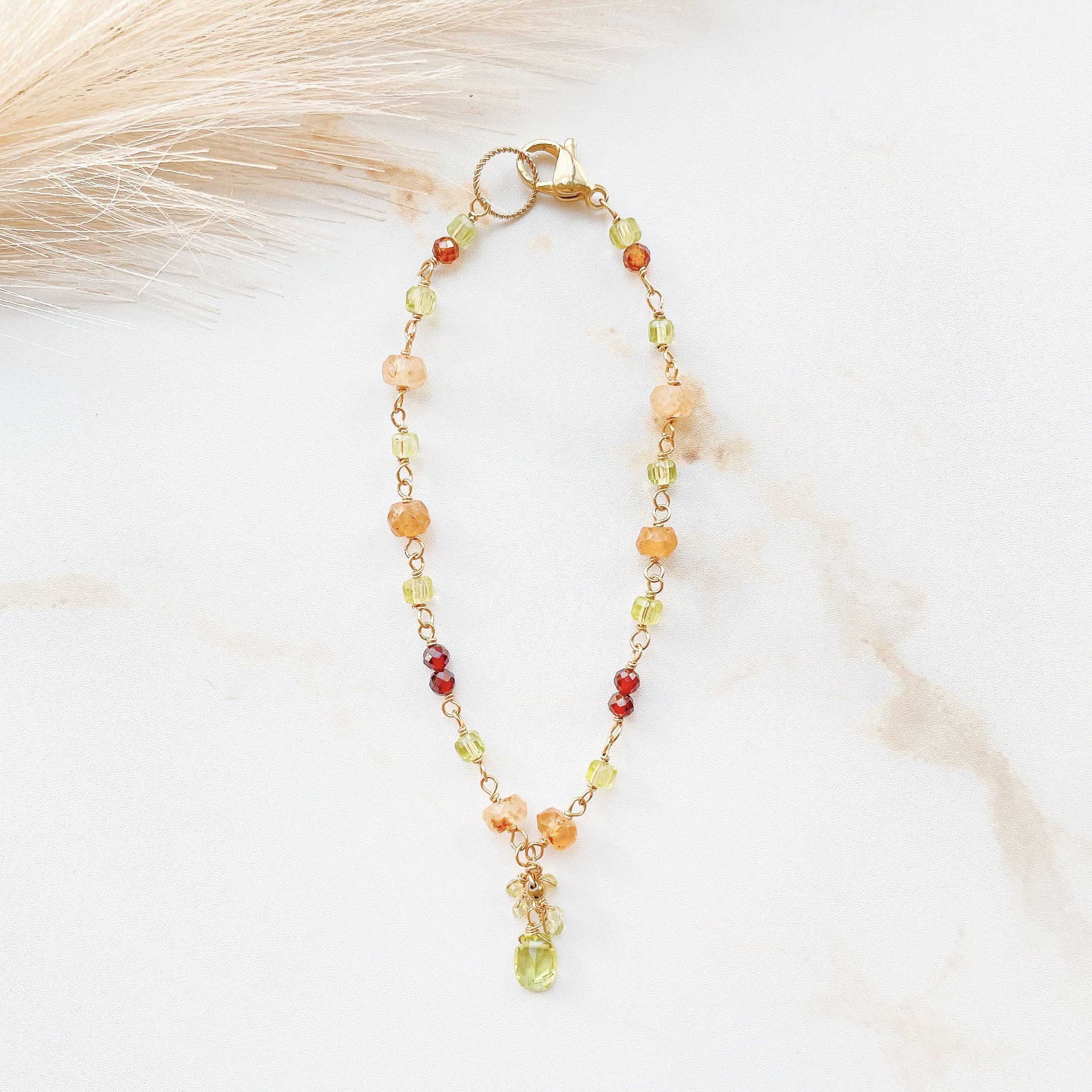 光のリズム＊ペリドット×ヘソナイトガーネットのブレスレット