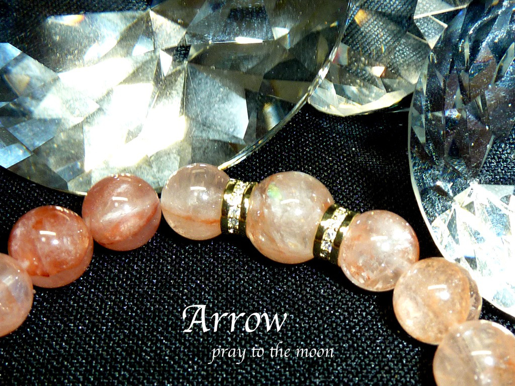 パールヴァティ渓谷産マニカラン水晶（ギャランティカード付）とH&E社アフリカ産ピンクファイアーアゼツライトブレスレット