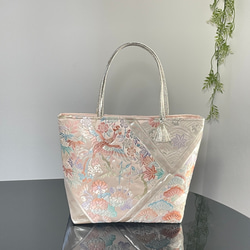 帯リメイクバッグ オレンジとゴールドの華文様 Mサイズ 和装バッグ 帯