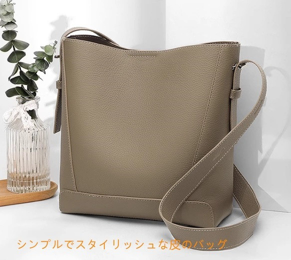 真皮のショルダーバッグ、質感のある牛革製のレディースバケツバッグ、2026年新作、通勤にぴったりなオールマイティな高級感